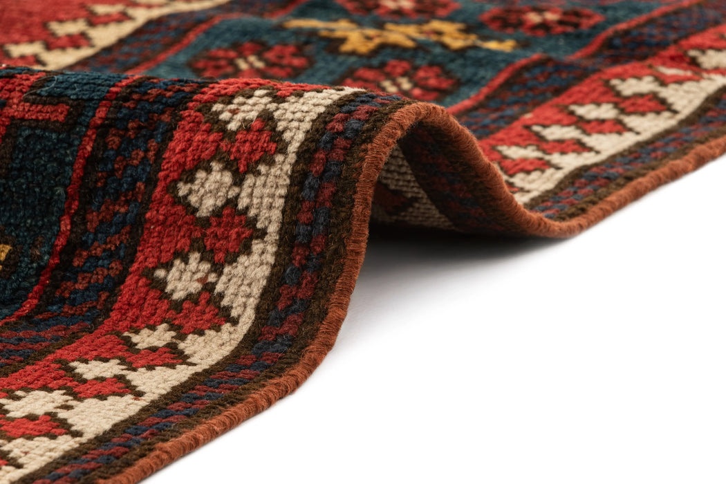 312 x 100 Kurden Teppich alt