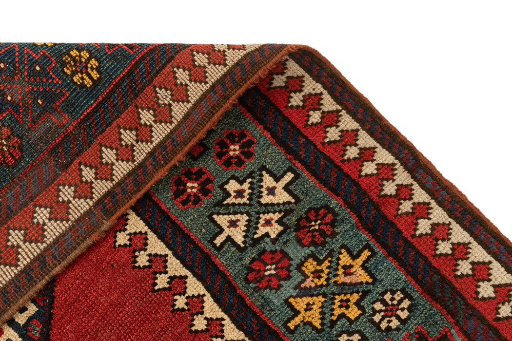 312 x 100 Kurden Teppich alt