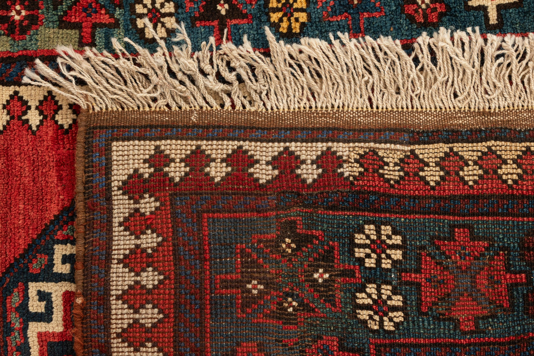 312 x 100 Kurden Teppich alt